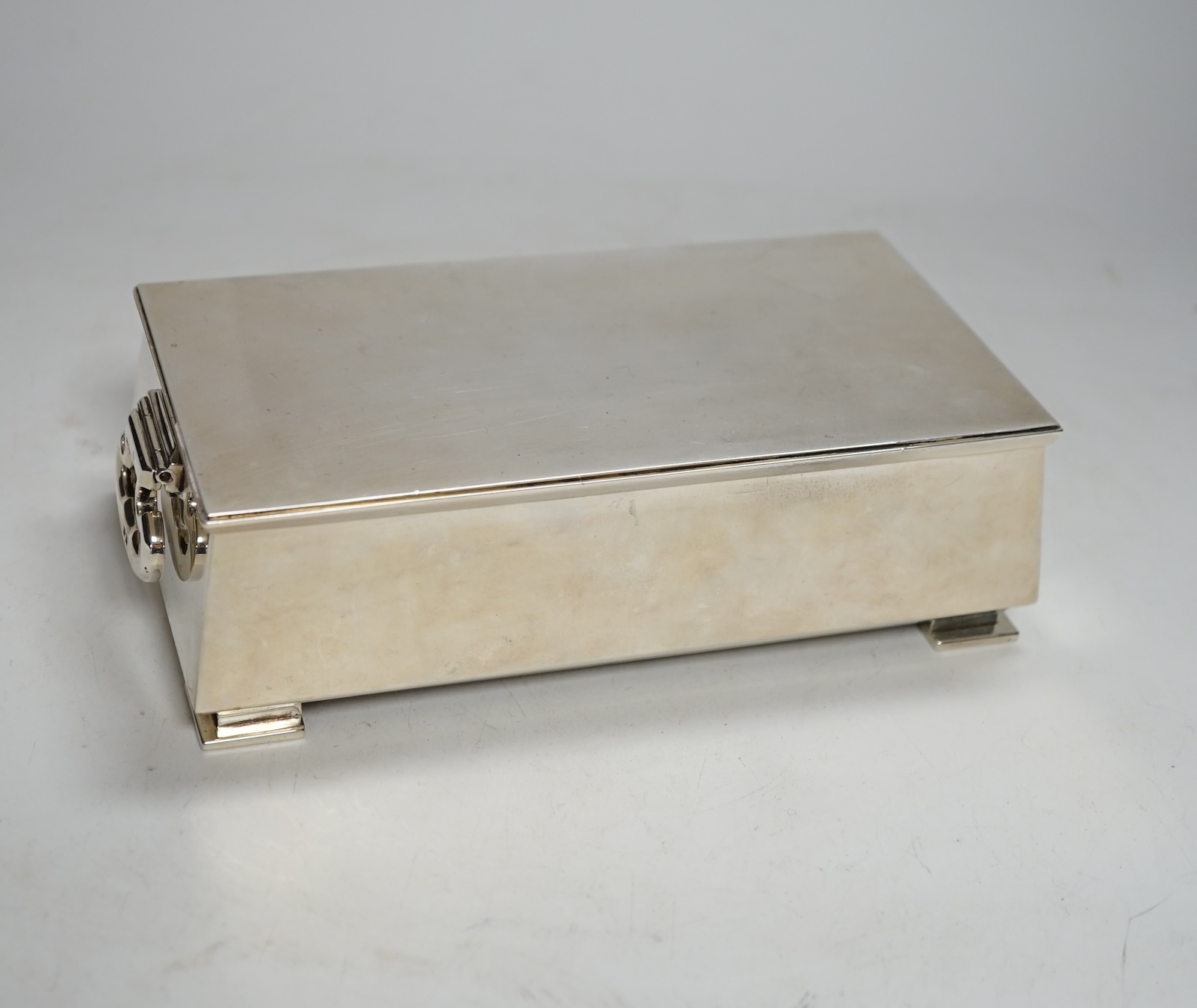 A George V Art Deco silver mounted two handled cigarette box, Padgett & Braham Ltd, London, 1935, 18.5cm.